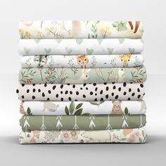 a stack of sheets with animals on them