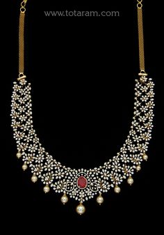 18 karat gold 'detachable / 4 in 1' diamond long necklace with color stones & culture pearls
      it can also be used as a short necklace
  length of the short necklace without back chain : 7.00 inches
  this product has a detachable pendant which can be used as a separate pendant with most chains.
  this product has inter changeable stones in the necklace and pendant.
   length of the pendant : 2.95 inches
  width of the pendant : 2.25 inches

  

introducing our exquisite 18 karat gold 'detac Diamond Necklace For Receptions And Festivals, Diamond Necklace For Reception And Festivals, Festival Diamond Necklace For Receptions, Festival Reception Diamond Necklace, Festival Diamond Necklace With Single Cut Diamonds, Temple Style Diamond Necklace For Reception, Festive Yellow Gold Diamond Bridal Necklace, Gold Diamond Necklace With Stone Work, Traditional Yellow Gold Diamond Necklace With Hand-set Diamonds