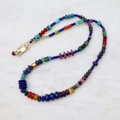 Lapis, fossil coral, chrysoprase, crystal, turquoise, ruby, sapphire, purple turquoise, amethyst, carnelian, Roman glass, phosphosiderite, apatite, and Czech Crystal, gold plated Thai silver accents Gold filled extender and lobster clasp 16-18" All natural stones, slight variations in color will occur Handmade in CT Riverstone Jewelry Spiritual Multi-stone Beaded Necklaces As Gifts, Spiritual Multi-stone Beaded Necklace For Gift, Multicolor Spiritual Gemstones With Accents, Spiritual Multicolor Gemstones With Accents, Multicolor Lapis Lazuli Necklaces With Natural Stones, Multicolor Lapis Lazuli Beaded Necklaces With Natural Stones, Multicolor Beaded Necklaces With Lapis Lazuli Stones, Multicolor Lapis Lazuli Beaded Necklace With Natural Stones, Multicolor Lapis Lazuli Natural Stones Beaded Necklace