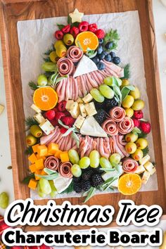 a christmas tree made out of fruit and cheese