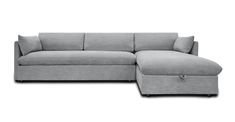 a gray couch with a footstool and ottoman on the bottom right hand side