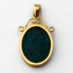 "Vintage 18 K (.750) yellow gold oval form pendant, decorated with inlaid Azurmalachite stone. This splendid pendant is 1 1/4\" long (including the bail), 5/8\" wide and weighs 4.2 grams. EA636" Elegant Oval Chrysocolla Necklace, Oval Malachite Jewelry In Yellow Gold, Formal Oval Malachite Jewelry, Yellow Gold Malachite Pendant Jewelry, Heavy Chain, Star Pendant Necklace, Business Checks, Square Pendant, Old Coins