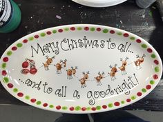 a christmas plate with santa's sleigh and reindeers on it that says merry christmas to all and tell a good night