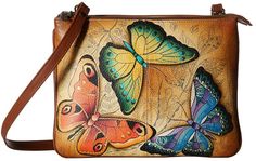 a purse with butterflies painted on it