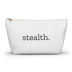 a white zipper bag with the word stealth printed on it's front and bottom