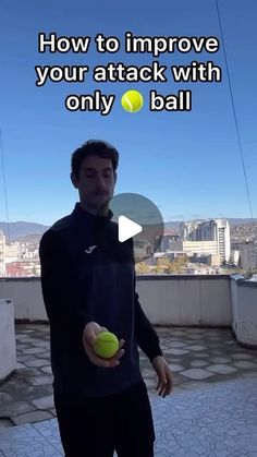 a man holding a tennis ball in his hand