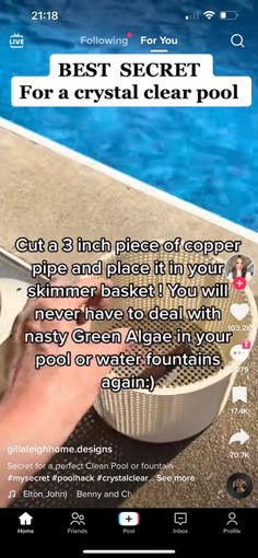 someone is using a pool cleaner to clean their swimming pool