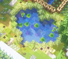 an aerial view of a small pond in the middle of a garden with lots of trees