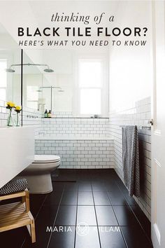 a black and white bathroom with the words thinking of a black tile floor? here's what you need to know