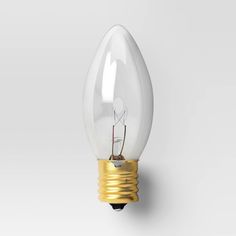 an electric light bulb with a small piece of wire sticking out of it's side