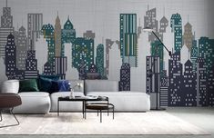 a living room with a couch, coffee table and large cityscape wallpaper