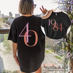 "Classic 1984 Shirts For Women, Vintage 40th Birthday Year Number Tshirt For Him, 40th Milestone Best Friend Bday Gift For Her, 40 Bday Shirt HOW TO ORDER ➀ Select color ➁ Select the size (Please check size chart) ✦ True to size. Size up 1-2 sizes for an oversized look. ➂ Add to cart ✦ (Optional) \"Add message to Seller\" on the checkout page. GARMENT FEATURES ✦ Crew neckline ✦ Direct to garment printing - no vinyl, decal, or iron-on technique ✦ Our designs are printed on the garment to last a long time and may not appear as 'glossy' or saturated as iron-on designs are. ✦ Please note that colors may appear different on different digital screens and may not be a true representation of the actual colors. ✦ Additional T-Shirt Colors and Sizes Available Upon Request ✧✧Brands: Bella Canvas Unis Vintage 40th Birthday, 1984 Shirt, Bday Shirt, Bday Gift, Purple T Shirts, Women Vintage, Shirts For Women, 40th Birthday, Comfort Colors