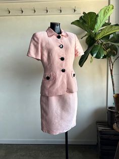 Vintage Christian Dior Bubblegum Pink Two Piece Suit Set. Pink in color, made from natural cotton and silk fibers in the USA. Two piece suit set with blazer and skirt. Jacket has oversized button closures along front. Skirt features a back zip up closure. Jacket and skirt are super soft. Condition overall is great with no noted flaws. No rips, tears, or staining. Please see all photos for details. Refer to measurements below to ensure a proper fit (modeled on a size small mannequin) Top: 19" pit to pit 16" shoulder to shoulder 26" in length Skirt: 14" across waist (28") 18" across hip 22" in length Small Mannequin, Pink Two Piece, Womens Suits, Vintage Christian Dior, Blazer And Skirt, Des Moines, Suit Set, Bubblegum Pink, Natural Cotton