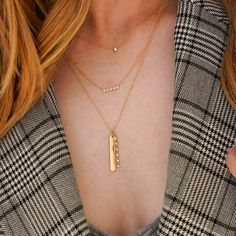 An instant classic, the Lulu Jack Vertical Bar and Diamond Bezel Link Necklace is already a DRD office favorite. A row of bezel-set diamonds rests next to a 14 karat gold bar. Giving the look and feel of a charm necklace, this modern and sleek layering piece is unlike anything in your collection. Pair it with your favorite bar necklace or rock it solo for a minimalist look. Make it your own by adding an engraving or contact us to make a custom charm. The Lulu Jack Vertical Bar and Diamond Bezel Classic Bar Necklace With Diamond Accents For Anniversary, Classic Diamond Accented Bar Necklace For Anniversary, Classic Diamond Accents Bar Necklace For Anniversary, Classic Bar Necklace With Diamond Accents, Classic Bar Necklace With Diamond Accents For Gifts, Everyday Gold Bar Necklace With Diamond, Gold Minimalist Diamond Bar Necklace, Minimalist Gold Diamond Bar Necklace, Everyday Yellow Gold Diamond Bar Necklace