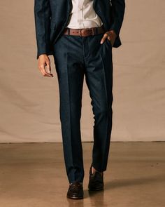 A simple yet sophisticated take on the classic wool trouser Slim Fit Business Pants For Fall, Business Slim Fit Pants For Fall, Fall Business Slim Fit Pants, Slim Fit Pants With Welt Pockets For Business Casual, Wool Business Casual Suits With Tapered Leg, Wool Tapered Leg Suits For Business Casual, Wool Tapered Leg Business Casual Suit, Slim Fit Wool Suit With Welt Pockets, Tailored Dress Pants In Suiting Fabric For Office Wear