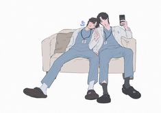 two people sitting on a couch, one holding a cell phone and the other taking a selfie