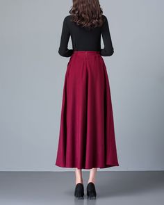 * A high-end long wool skirt with wide hem, very cool. * Made of wool blends, fully lined and with two side pockets. * Fixed waist on front, partial elastic waist on back and side invisible zipper. * Can custom make waist size and skirt length. * Material: Outer-50% wool, 50% polyester; lining-100% polyester * Washing instructions: Dry Clean Only * Size: True to US size, US 0-US 20 are available, you can let us know your usual size and height in your order. * Shipping: Free shipping Processing t Fall Wide-leg Lined Skirt, Fall Wide Leg Lined Skirt, Fall Maxi Skirt With Pockets, Burgundy Skirt For Fall, Winter Wide Leg Skirt With Pockets, Brown Wide Leg Winter Skirt, Winter Wide Leg Maxi Skirt, Winter Full Maxi Skirt With Pockets, Fall Solid Color Wide Leg Maxi Skirt