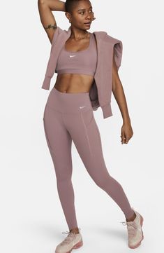 Get ready to move in these stretchy leggings that help smooth and lift to keep you feeling comfortable with squat-proof confidence and signature Dri-FIT tech. 10" front rise; 13" back rise, 26 1/2" inseam (size medium) Lined gusset Dri-FIT moisture-wicking technology 76% nylon, 24% spandex Machine wash, dry flat Imported Getting Ready To Move, Nike Brown, Perfect Legs, Leggings With Pockets, High Waist Leggings, Stretchy Leggings, Nike Leggings, Swimwear Dress, Women Lifestyle