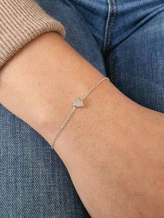 Dainty Tiny Heart Bracelet, Gold Plated Heart Charm, Monogram Letter Bracelet, Bridesmaid Gift, Girlfriend Gift, Personalized, Lovers Gift Treat yourself to the minimalist look of this gold plated heart bracelet. It looks just as amazing worn by itself, as it does stacked with one of our bracelets available in our store. The heart measures approximately 1 cm and it moves loosely on the delicate cable chain. Also a perfect gift for your bff, your bridesmaids, or a special person in your life. Det Silver Heart Charm Jewelry For Bridesmaid, Dainty Heart Bracelet For Valentine's Day, White Heart Bracelet For Gift, White Heart Bracelet For Wedding, White Heart-shaped Bracelet For Weddings, White Heart-shaped Wedding Bracelet, Minimalist Heart Charm Bracelet For Mother's Day, Dainty Heart Charm Bracelet For Valentine's Day, Dainty Heart Charm Bracelet For Wedding