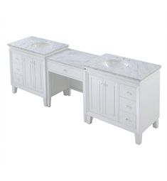 two white vanity sinks sitting next to each other