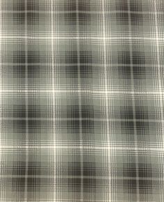 a plaid fabric with black and white checks