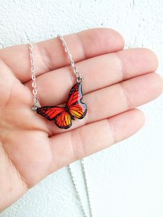 "❤️Looking for a special gift for a butterfly enthusiast or nature lover? Look no further than this beautiful butterfly pendant necklace! Crafted with intricate attention to detail, these pieces feature delicate wings and stunning colors that are sure to impress. Whether you're shopping for yourself or someone special, these necklaces make a fantastic choice. They're perfect for adding a touch of natural beauty to any outfit, and their compact size means they can be worn anywhere. So why wait? T Butterfly Charm Jewelry As Gift For Her, Multicolor Butterfly Jewelry For Gifts, Multicolor Butterfly Jewelry Gift, Orange Butterfly Jewelry For Gifts, Orange Butterfly Jewelry Gift, Orange Butterfly-shaped Jewelry Gift, Mother's Day Butterfly Jewelry With Butterfly Charm, Mother's Day Jewelry With Butterfly Charm, Mother's Day Butterfly Charm Jewelry