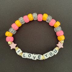 These individual bracelets feature a small phrase and varying color schemes. Keep in mind that these are made with adults in mind, and the phrases may be inappropriate. The goal is to design something that bring a chuckle or smile to someone's day, and all of the kandi made by BaphoBabes mindfully. Be safe out there and stay mindful of each other as well. The fit of each bracelet is for an average wrist, early bracelet averages between 2.5in to 3in diameter with small fit variation due to bead size/shape. If you have any questions regarding a product, please feel free to send a message through Etsy or email BaphoBabes@gmail.com. If you have interest in anything custom, please contact me through Etsy. Couples Bracelets Beads, Pink Meaningful Bracelets For Friendship, Meaningful Pink Friendship Bracelets, Inspirational Pink Bracelets For Valentine's Day, Trendy Pink Beaded Bracelets With Letter Print, Casual Pink Bracelet With Letter Print, Trendy Pink Bracelets With Letter Print, Trendy Pink Letter Print Bracelets, Multicolor Name Bracelet With Letter Print For Friendship