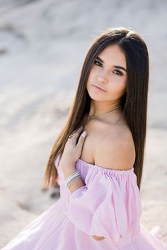 Fall senior pictures in Folsom, Ca. Girl wearing pink dress near the beach of the lake Senior Photo Poses