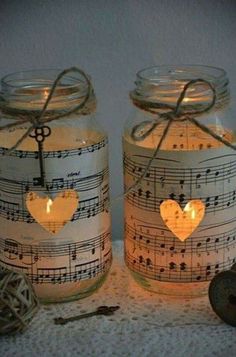 two mason jars with musical notes on them