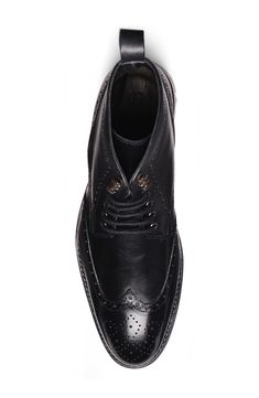 Brogue perforations and a wingtip toe add vintage distinction to a luxe lace-up boot rendered in polished leather. Leather upper and lining/rubber sole Imported Asian & Pacific Islander Owned/Founded Pacific Islander, Flip Flop Slippers, Sweaters And Leggings, Comfortable Sandals, Black Fits, Lace Up Boots, Boots Men, Girls Shoes