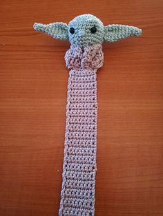 a crocheted tie with an elephant head on it