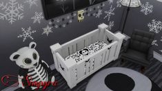 a baby's room decorated in black and white with snowflakes on the walls