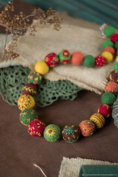 a close up of a bracelet on a table