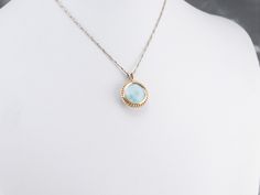 Larimar is called the sea stone, and this gorgeous pendant provides an excellent example of why! The rope-twist framework of yellow gold brings warmth and richness to the larimar, pulling the waves of seafoam green forward and swirling them with the other shades. This pendant does not come with the chain shown. Please feel free to contact us, we will help you find the perfect chain for your style and budget! Metal: 14K Yellow Gold Gem: Larimar Gem Measurements: 12.0 mm, Round Measurements: 17 x Vintage Gold Pendant, Blue Stone Pendant, Bridal Jewelry Vintage, Larimar Jewelry, Rope Twist, Cameo Ring, Right Hand Rings, Jewelry Birthday, Cabochon Pendant