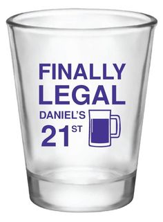 a shot glass with the words finally legal and 21 st printed in blue on it