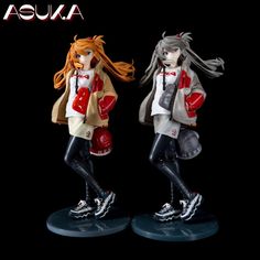 two figurines that are standing next to each other on a black background with the caption awa