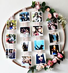 a circular wooden frame with pictures and flowers on it