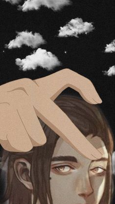 a person holding their hand up to the sky with clouds in the background and one finger pointing at them