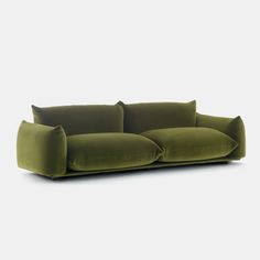 an olive green couch with two pillows on it's back and one arm facing the camera