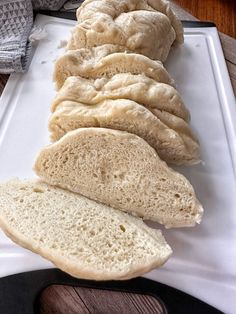 bread slices on a white platter ready to be cooked