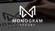 the monogram luxury logo is designed to look like it has a triangular shape and letters