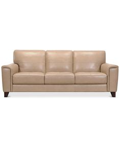 a tan leather couch on a white background