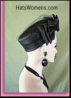 Women's Black Designer Satin Formal Pillbox Bridal Wedding Hat. This Cocktail Hat Is Embellished With A Satin Bow And Birdcage Netting Around The Side And Top Of The Crown. Note: The Netting Does Not Cover The Face. A Large Birdcage Netting Bow Is Placed Under A Triple Satin Bow For Classic Couture Styling. A Perfect Hat For A Bride Or Mother Of The Bride Or Groom. This Designer Fashion Church Hat Is Custom Made And Designed By NY Fashion Hats Custom Millinery Headwear. http://www.nyfashionhats. Classic Couture, Mother Of The Bride Hats, Hat With Veil, Formal Hat, Bespoke Hats, Royal Ascot Hats, Veiled Hats, Black Tie Party, Couture Hats