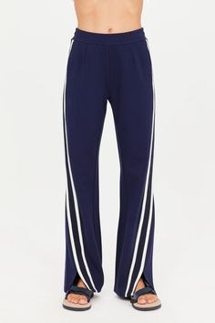 Free ground shipping on orders $195+ & free returns on The Upside Petra Flare Pant in Navy at BANDIER. Shop new arrivals at Bandier.com. Full Length Pants With Side Stripes, Stretch Bottoms With Contrast Trim For Loungewear, Sporty Pants With Contrast Trim, Active Sets, Flare Pant, Nike Accessories, The Upside, Nike React, Women's Activewear