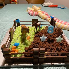 a cake made to look like a farm scene