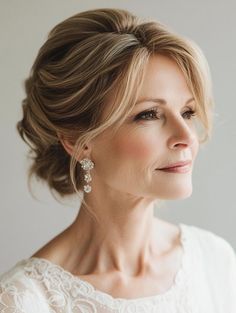 Elegant Wedding Hairstyles for the Mother of the Bride Mob Half Up Hairstyles, Mother Of The Bride Short Hairstyles, Wedding Hair Mother Of Bride, Brides Hairstyles Medium Length, Low Chignon Wedding, Vintage Finger Waves, Mother Of Bride Hairstyles, Bridal Low Bun, Mother Of The Bride Hairstyle