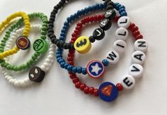 "Child's Personalized Super Hero Bracelet - Order with or without name. Each bracelet is made with 4mm seed beads, silicone \"hero\" bead and letter beads if ordering with name." Avengers Bracelet, Hero Bracelet, Boys Bracelets, Bff Bracelets, Polymer Clay Bracelet, Huntsville Alabama, Clay Bracelet, Beads Bracelet Design, Letter Beads