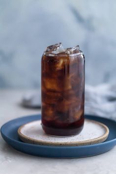 an iced drink on a plate with ice