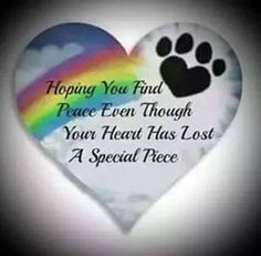 a heart shaped paper with a rainbow and paw print on the side, saying happy you find peace even through your heart has lost a special piece