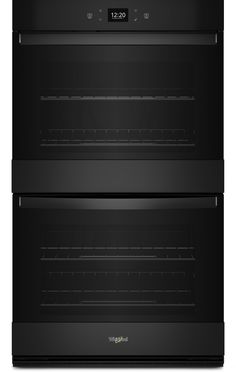 two black ovens side by side on a white background